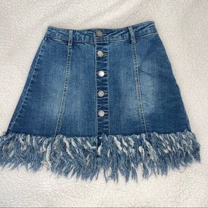 Denim skirt with fringes only worn one time in perfect condition!